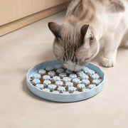 PETNEST Ceramic Bowl — Sky blue paw-pattern in use by a cat