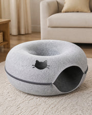 Felt Donut Tunnel Bed with Hole — Light Gray 60 cm in a warm neutral home setting