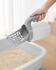 Cat using the integrated litter scoop / waste bin — 10 rolls