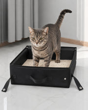 Cat using the portable folding travel litter box — black 40 × 30 × 15 cm