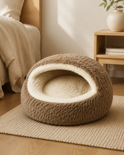Shell-Shaped Plush Cave Bed — Khaki Large in a warm neutral home setting