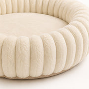 Close-up detail of the warm ribbed donut bed — beige large 60 cm